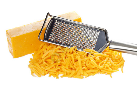 切达干酪碎条和金属干酪刨丝器图片