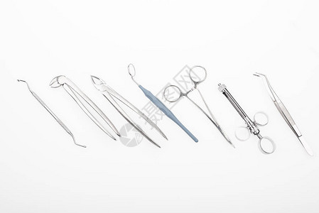 白色孤立的牙科镜及专业牙医工具图示顶端图片