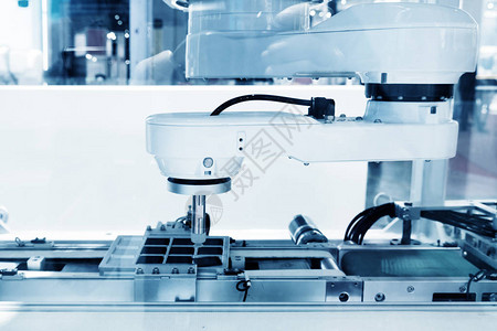 工业机器和工厂机器人臂图片