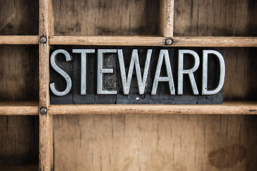 STEWARD这个词是用古代金属印刷品写在一个有隔板图片