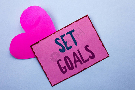 商业照片展示目标规划愿景梦想目标理念目标动机写粉红色便条纸背景图片
