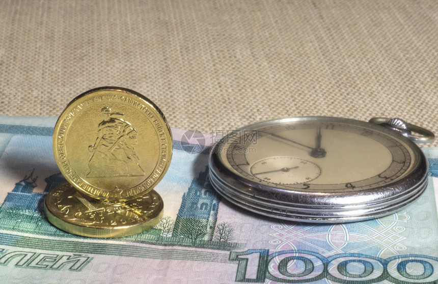 Retro袖珍手表卢布钞票和纪念硬币斯大林格勒图片