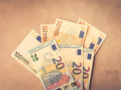 带纹理的背景下的欧元洲货币钞票顶视图色调工资储蓄欧盟背景图片