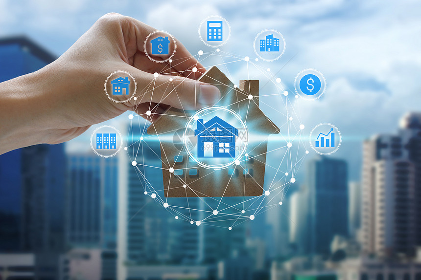 在房地产背景房地产投资概念的网络连接上手持房地产投资图标图片