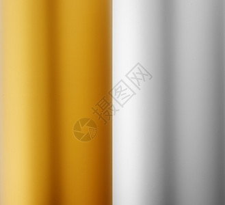 金色和银色铝制圆柱形纹理背景图片