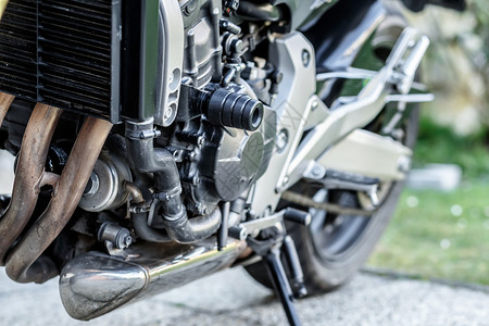 浅聚焦的摩托车发动机特近背景图片