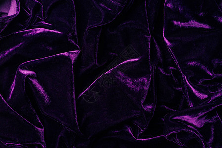 深紫罗兰闪亮的天鹅绒纺织品作为背图片