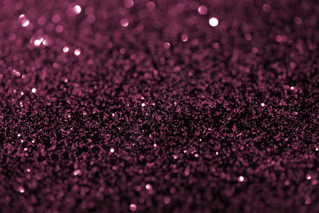 闪亮的抽象深紫色闪光纹理背景图片