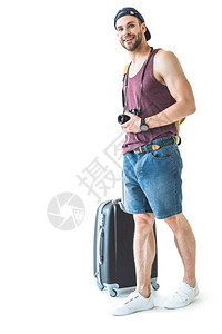 带旅行袋和摄影机的快乐男游客准备出行图片