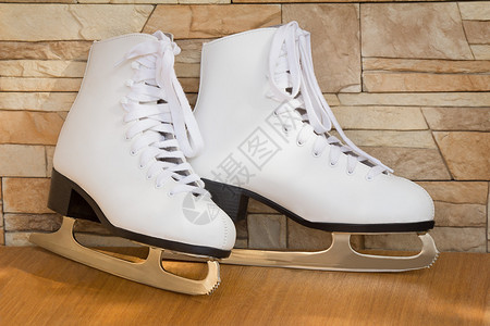 滑冰鞋和优雅的白色靴子供女图片