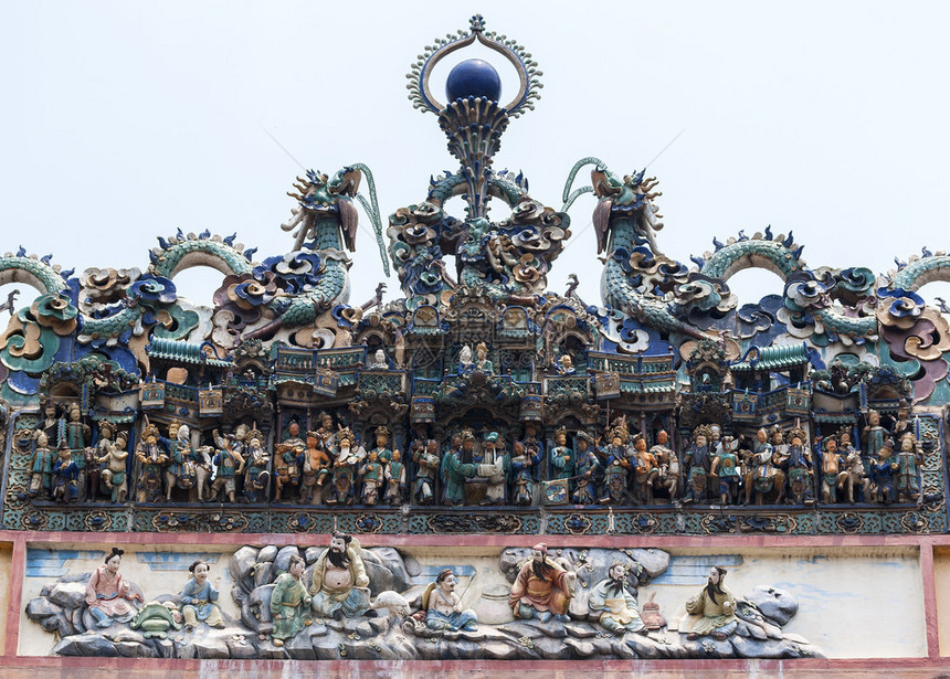 这只是胡志明市寺庙墙壁陶瓷装饰的少量例子图片