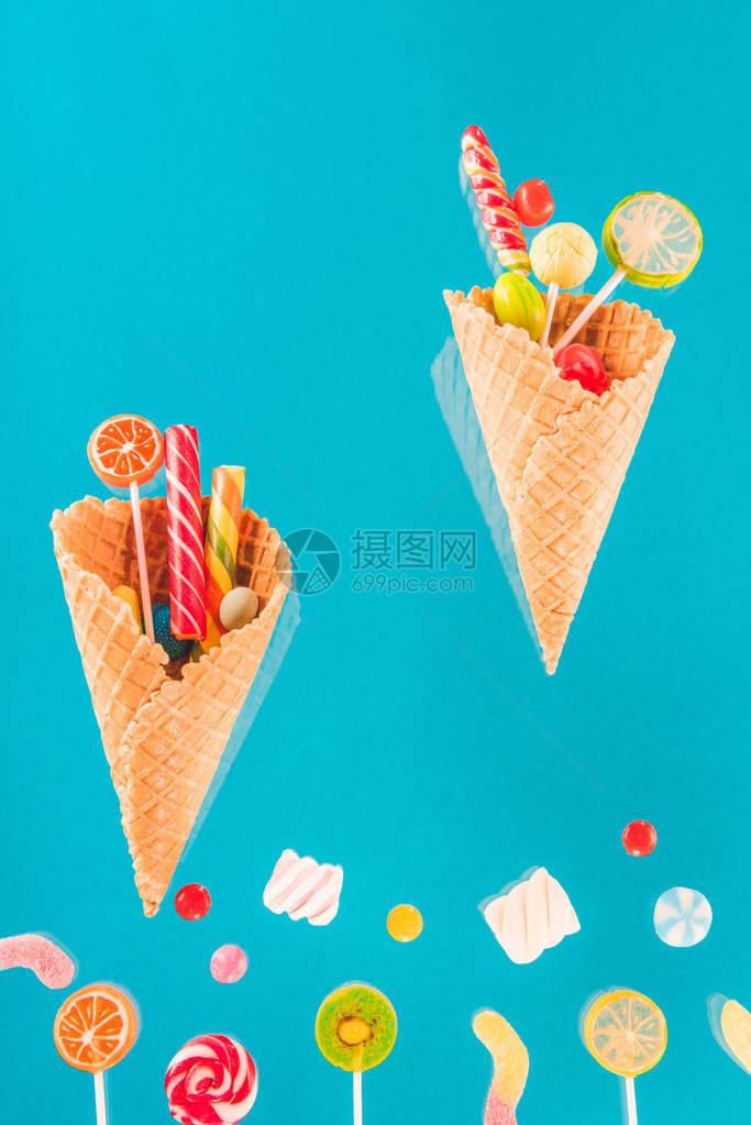 与不同的美味果冻冰淇淋和小棒图片