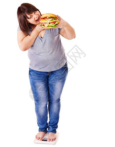 女人在体重秤上减肥孤立图片