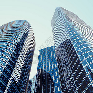蓝色玻璃摩天大楼高层建筑摩天大楼成功工业建筑的商业理念图片