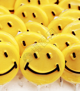 黄色棒糖上的笑脸情绪图片
