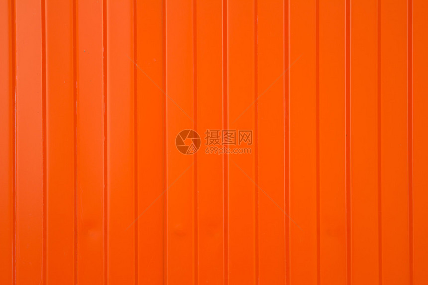 以窄而宽的垂直橙色条纹形式的背景图片
