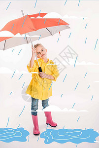 穿着黄色雨衣拿着雨伞雨季和水图片