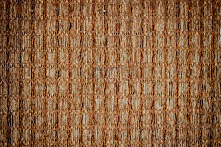 背景和纹理的棕色竹草席图片