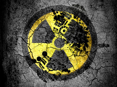 核辐射符号涂在破碎的地面上图片