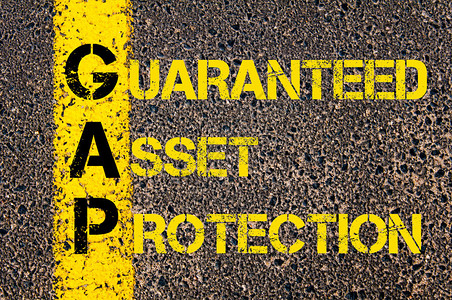 商业首字母缩略词GAP的概念图像作为保证资产保护写在道路标记图片