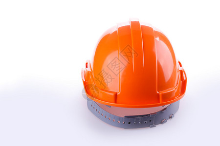 橙色安全头盔硬帽建筑业危险工人保护工具白底隔离图片