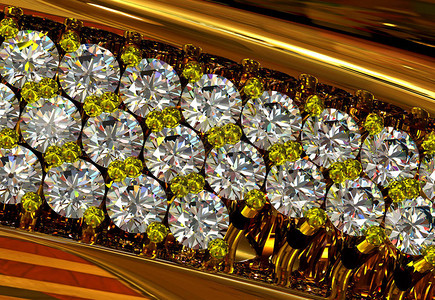 镶有宝石的金戒指上的钻石组用宝石拍摄宏观抽象奢华珠图片