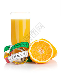 橙汁和测量胶带饮食品图片