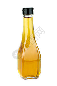 白色背景上的苹果醋玻璃瓶图片