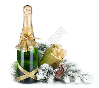 香槟酒瓶圣诞礼物和雪白的f图片