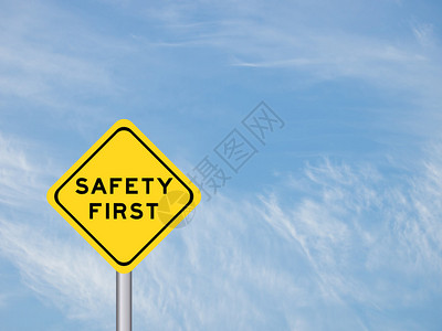 黄色交通标志上写着安全第一蓝色图片