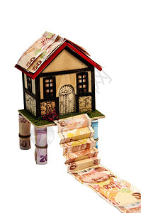 小房子和土耳其钱被白色隔离图片