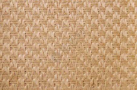 手工编织的稻草图案背景图片