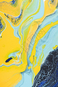 用黄色和蓝色油漆着色的抽象丙烯酸纹理图片