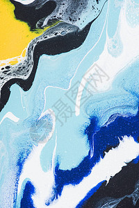 黄色和蓝色丙烯酸漆的抽象设计图片