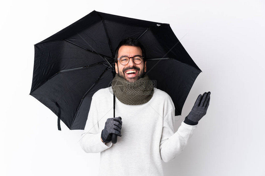 白人英俊帅哥长着胡子拿着雨伞在图片