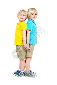 两个天主教男孩双胞胎兄弟在演播室中图片