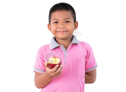 快乐的亚洲孩子吃苹果图片