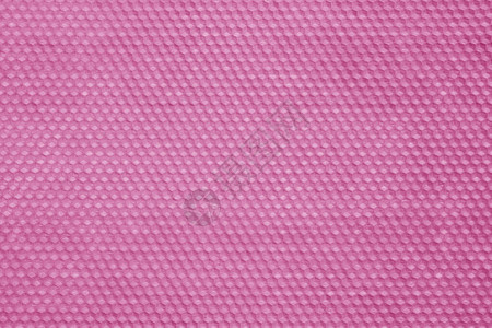 粉红色的蜂窝蜡纹理背图片