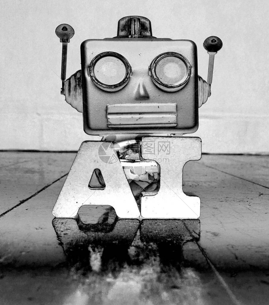 银色机器人头和字母AI图片