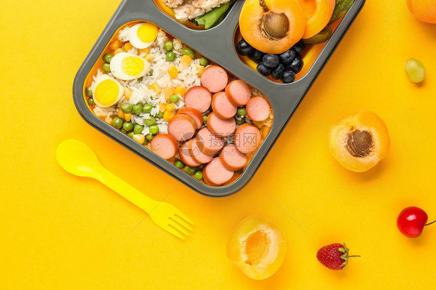 学校午餐盒以彩色为背图片