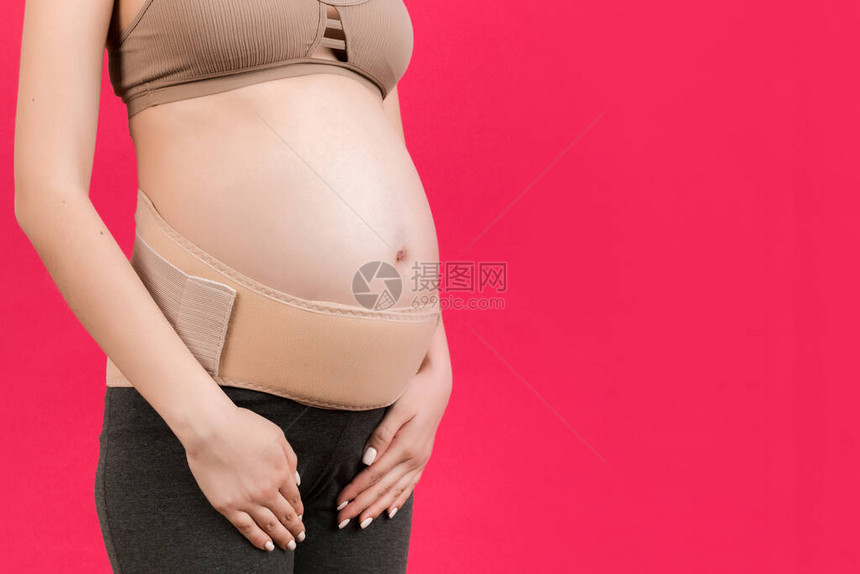 围在孕妇身上的孕带切除图像图片