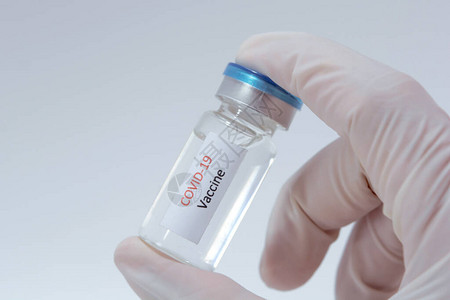 医生手中的COVID19疫苗科罗纳图片