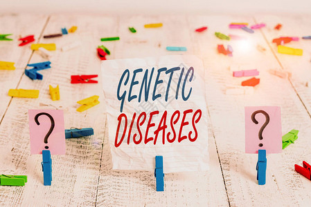 手写文本遗传疾病由个体s异常引起的概念照片疾病是基因组乱涂画的纸片图片