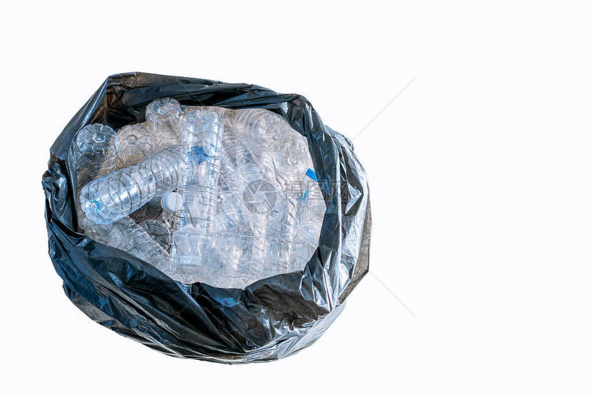 垃圾袋中的塑料瓶全球暖化概念在白色背图片