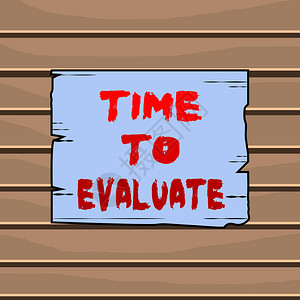 概念手写显示评估时间概念意义判断某物的价值或意义木板槽图片