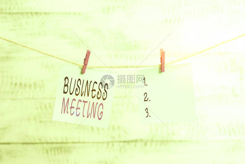 显示商务会议的文本符号商业照片展示两个或多个展示的聚集以讨论商业理念晾衣绳夹矩形纸图片