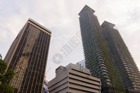马来西亚吉隆坡市城天际线的低角图LowangleViewofCitySky背景图片