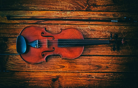 克雷莫纳木小提琴和弓的抽象艺术设计背景插画