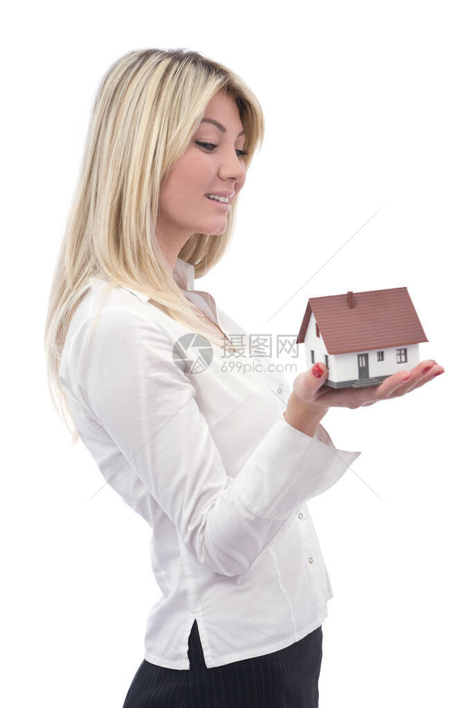 房屋和女商人的房地产中住房投资概念与图片