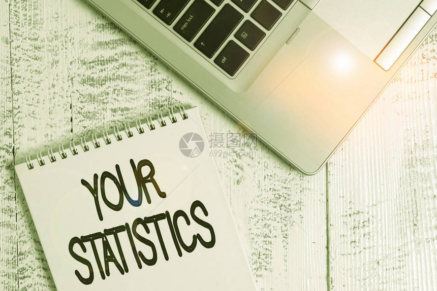 显示您的统计数据的书写笔记基于研究次数的信息商业概念顶级金属笔记本电脑空白螺旋记事图片